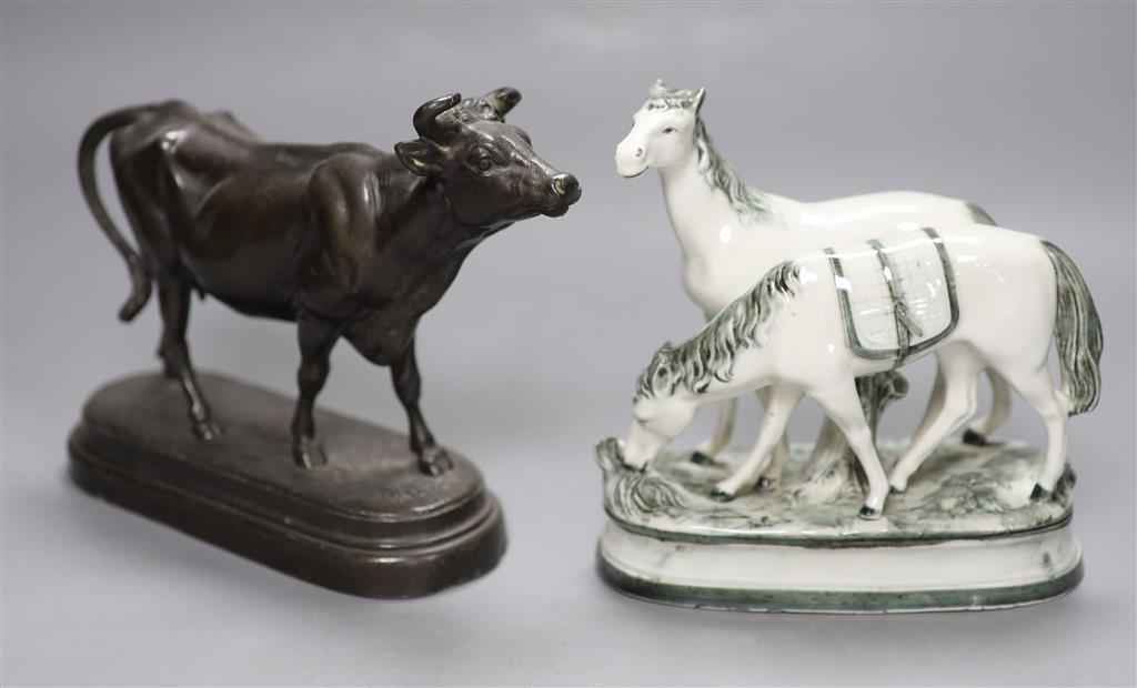 A patinated spelter figure of cow, signed C. Valton and a group of porcelain animal and bird figures